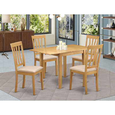 L'ensemble de salle à manger 5 pièces comprend une table de salle à manger rectangulaire avec Dropleaf et 4 chaises de cuisine rembourrées en similicuir, 30 x 48 pouces, chêne