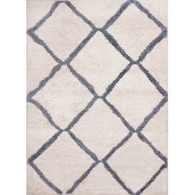 Tapis géométrique crème