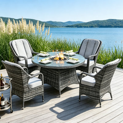 4 - Person Patio Dining Set with Round Table , Cushions Included