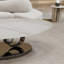 Table basse en marbre avec base sculpturale en acier inoxydable