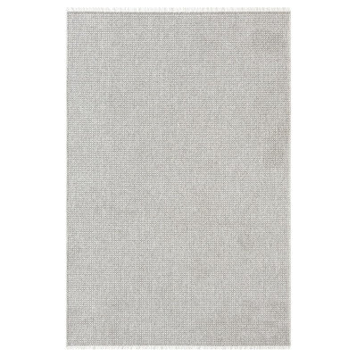 Tapis texturé à franges