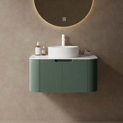 Meuble-lavabo flottant avec rebords courbés, cuve en céramique et plateau en pierre frittée