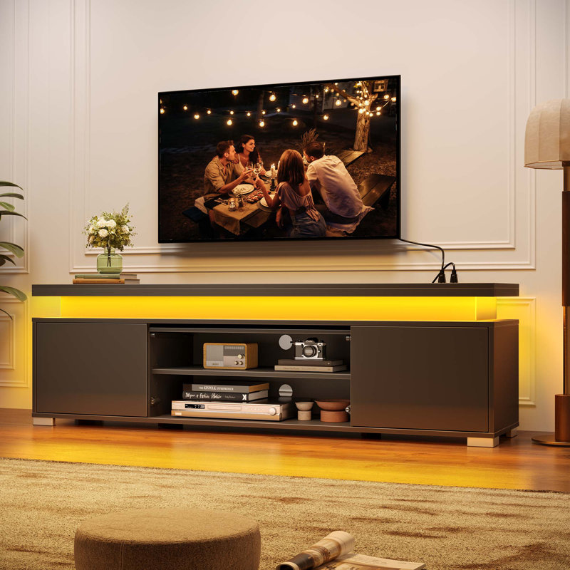 TV Stand for TVs up to 65", Entertainment Center with Storage, RGB LED Lights and 4 AC Outlets, Black