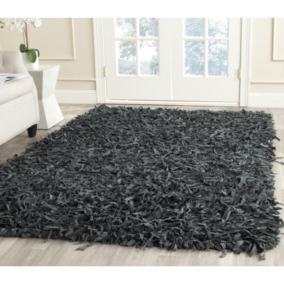 Godsey Hand-Hooked Black/Grey Area Rug