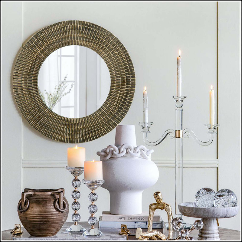 Miroir d'appoint rond avec cadre tissé noir et doré