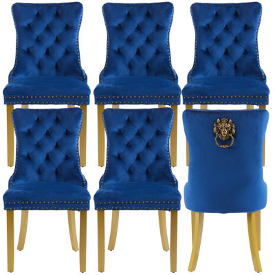 Chaises de salle à manger rembourrées en velours et oreilles capitonnées Traditional
