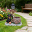 Charmante statue d'extérieur pour jardinière, parfaite pour ajouter de la fantaisie et de la verdure aux jardins et aux patios.