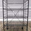 Présentoir de boulangerie 24,8 po x 16,5 po x 48 po avec roulettes, 5 tablettes réglables et 2 porte-enseignes - noir