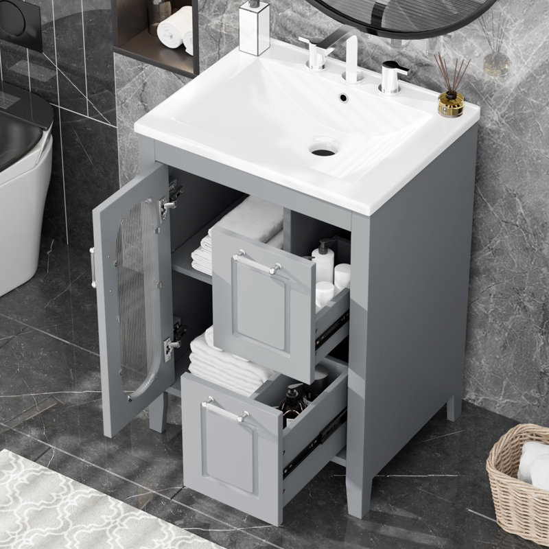 Meuble-lavabo moderne de 24 po en bois massif avec une finition grise, un lavabo avec deux tiroirs et une armoire à tablette réglable