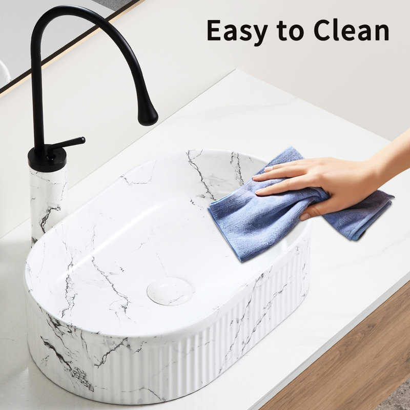 Vasque ovale de salle de bain en marbre noir et blanc 48 x 30 cm, en porcelaine céramique avec aérateur à surface lisse, céramique durable, robinetterie incluse, résistante à la chaleur