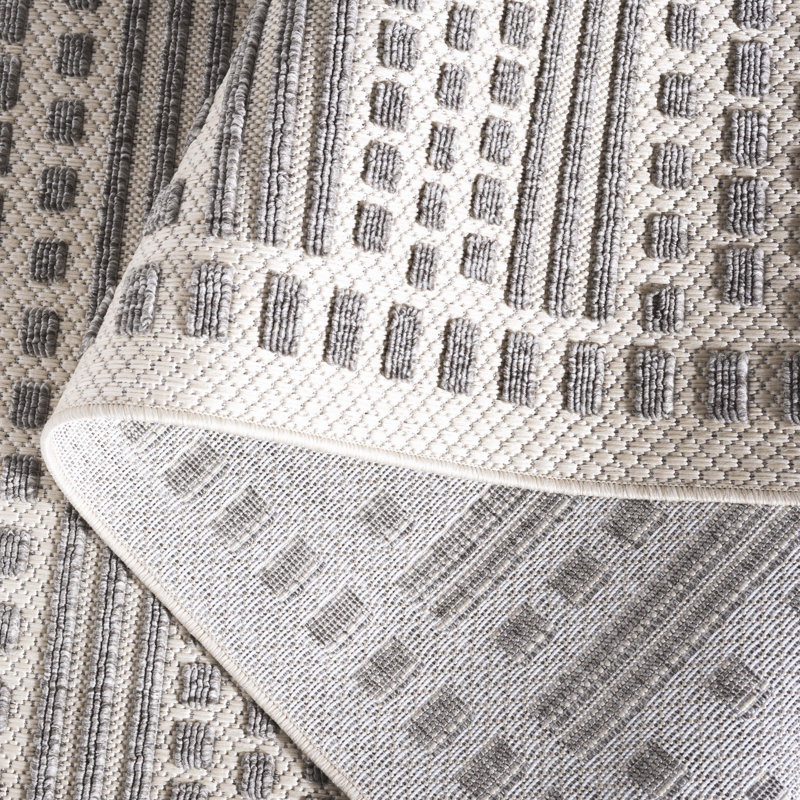 Gray and Beige Geometric 8' x 10' Synthetic Area Rug