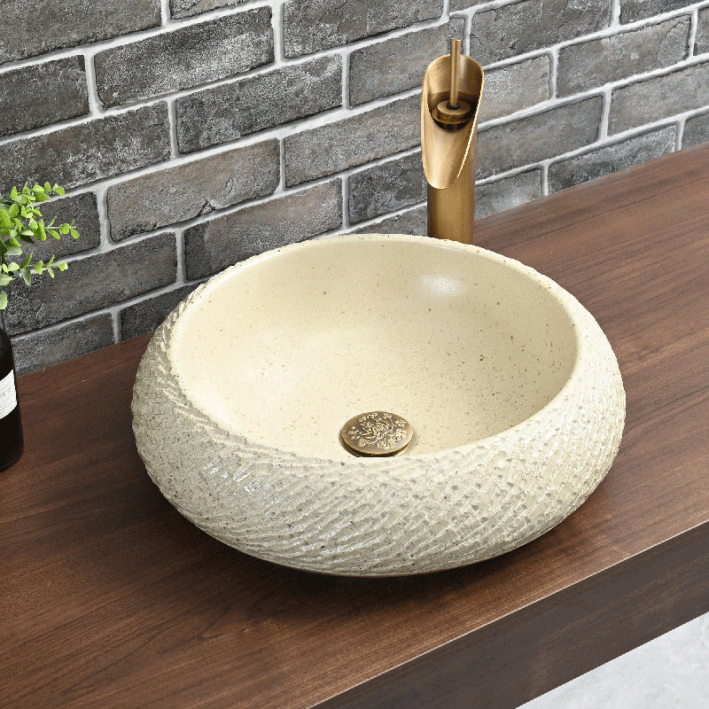 Lavabo de salle de bain circulaire fait à la main 17,7 "avec bonde escamotable sculptée antique, Beige