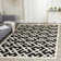 Nilufer Geometric Wool Hand Woven Area Rug