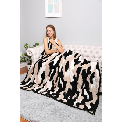 Jeté de luxe à motif léopard