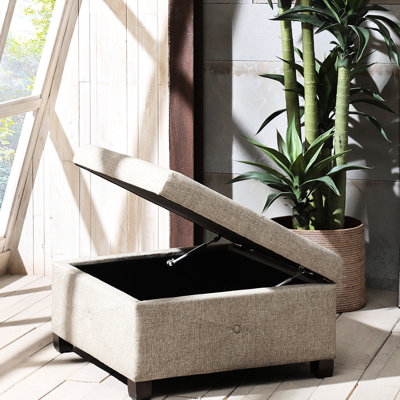 Élégante couleur sable avec ensemble de pieds en bois massif avec rangement rembourré sable - intérieur spacieux et couvercle doux