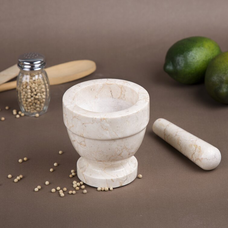 https://assets.wfcdn.com/im/24497287/resize-h755-w755%5Ecompr-r85/9095/90959408/Marble+Mortar+And+Pestle+Set.jpg