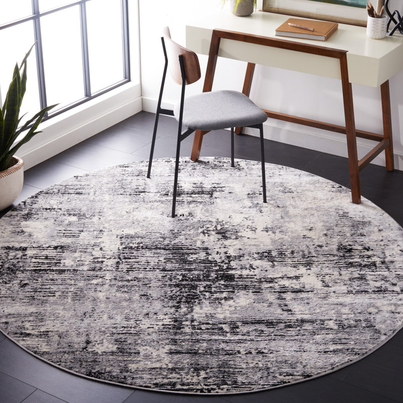 Abstract Power Loom Black/Ivory Area Rug, Round 6'7"
