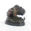 Figurine lion avec hochet serpent