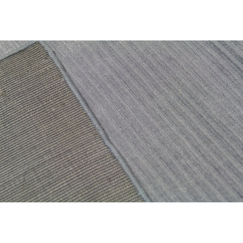 Tapis bleu clair noué à la main de haute qualité
