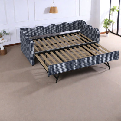 Canapé-lit convertible, tissu à carreaux, sommier à lattes en bois, chambre d'amis moderne avec deux lits simples