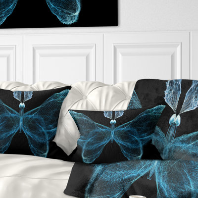 Coussin à imprimé floral turquoise
