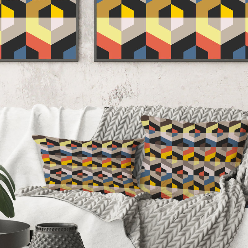 Coussin décoratif à motif géométrique jaune, bleu et orange