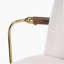 Tabouret de bar industriel moderne avec structure en métal et accoudoirs courbés