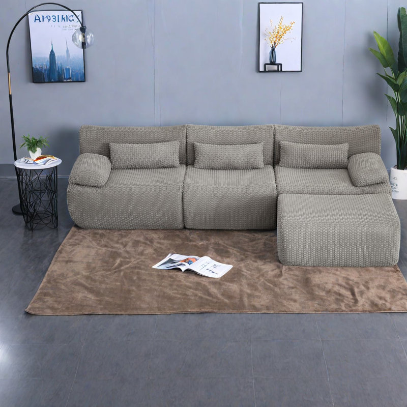 Canapés moelleux en velours côtelé gris, style durable pour les espaces familiaux