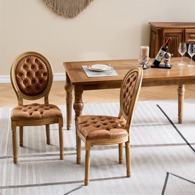 Chaise de salle à manger en cuir artificiel avec boucle à la main et garniture cloutée