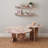 Blush pink marble nesting coffee table set with round tables, versatile living room centerpiece in minimalist style