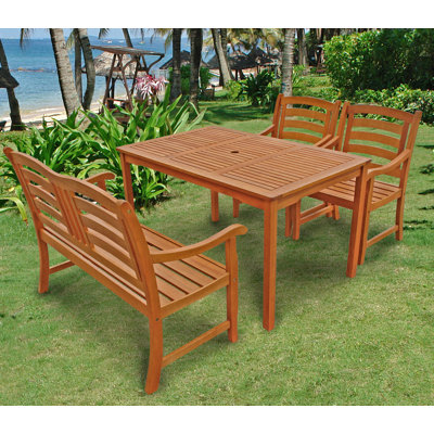 Izaguirre 4 - Person Wood Patio Dining Set with Rectangular Table