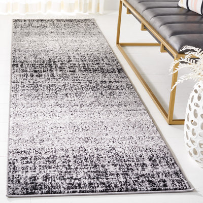 Tapis abstrait argenté / noir Riebe
