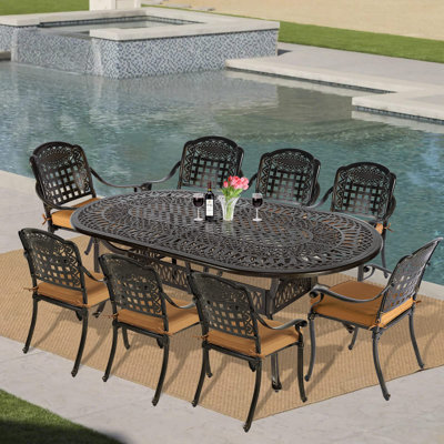 Oval 8 - Person 83.8" Long Dining Set with Cushions by Bloomsbury Market