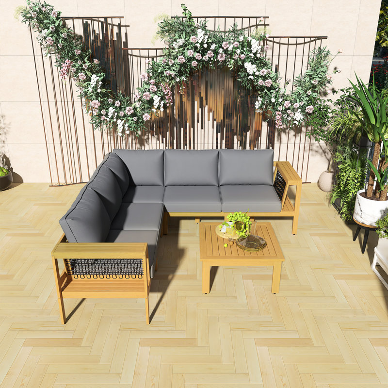 Ensemble de canapé d'extérieur en bois d'acacia en forme de L 4 pièces, accoudoirs en filet tissé, avec table basse, coussins gris, ensemble de conversation pour l'extérieur