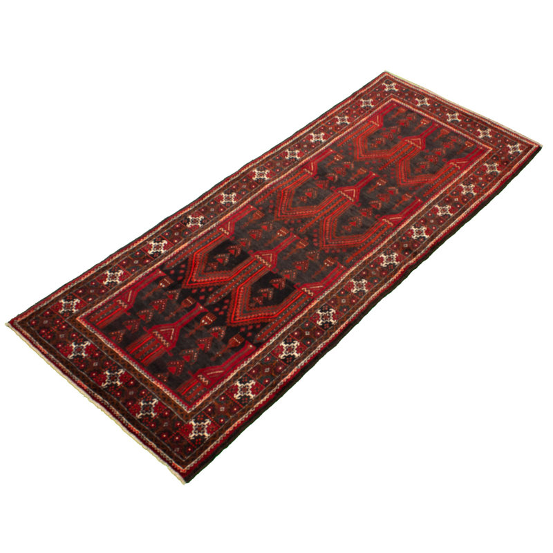 Tapis rouge en laine noué à la main