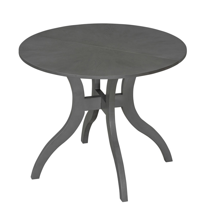 Table de salle à manger ronde en bois d'hévéa et contreplaqué, fini chêne gris, piètement incurvé à plusieurs pieds, 100 cm de diamètre, idéale pour les petits espaces.