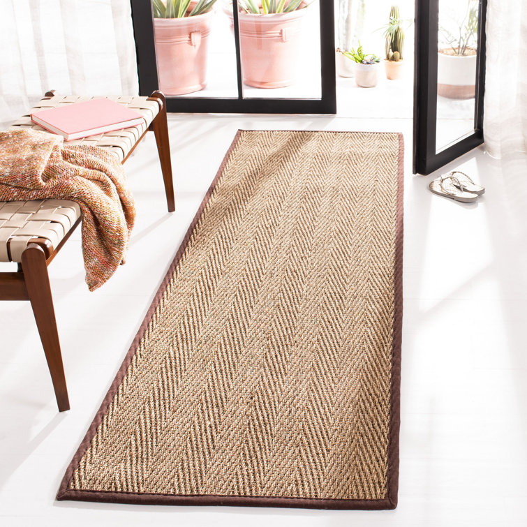 Heenan Natural Fiber Seagrass Solid Color Rug