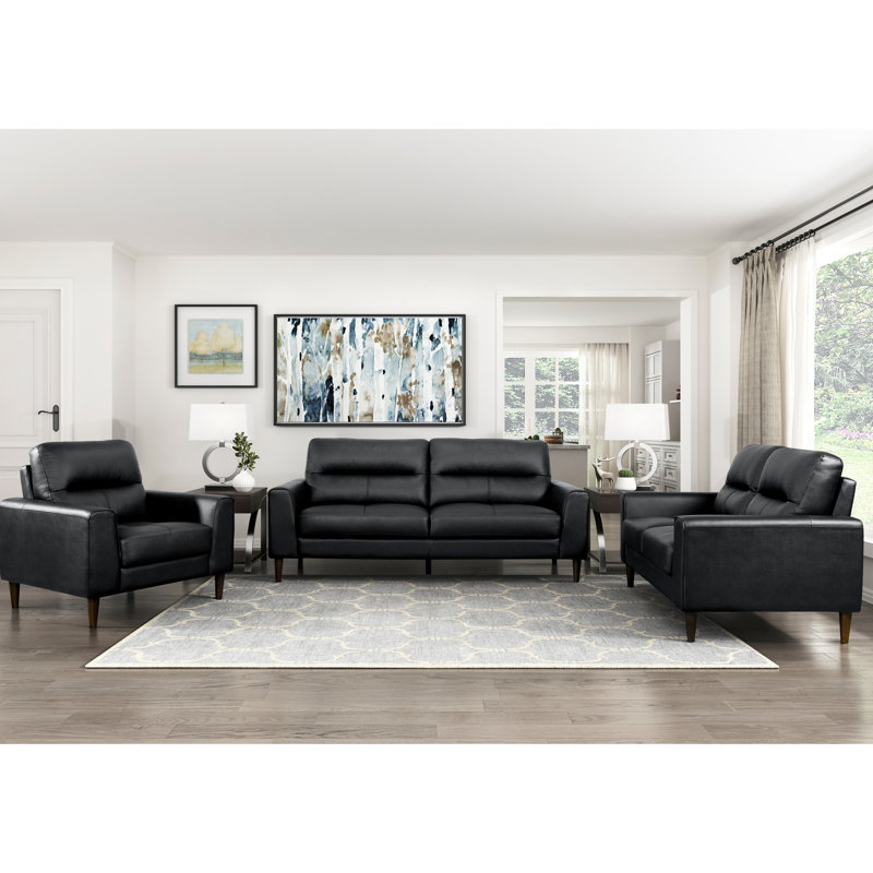 Cuir noir avec mousse à haute densité, structure en bois massif, assise de 20,5 po de profondeur, coussins en mousse de style rétro, largeur du produit de 34,5 po, lignes