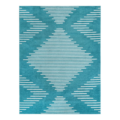 Tapis bleu à motif géométrique