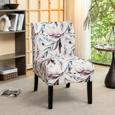 Fauteuil en tissu imprimé avec motif floral mauve - Espace de vie moderne, assise confortable et sans accoudoirs