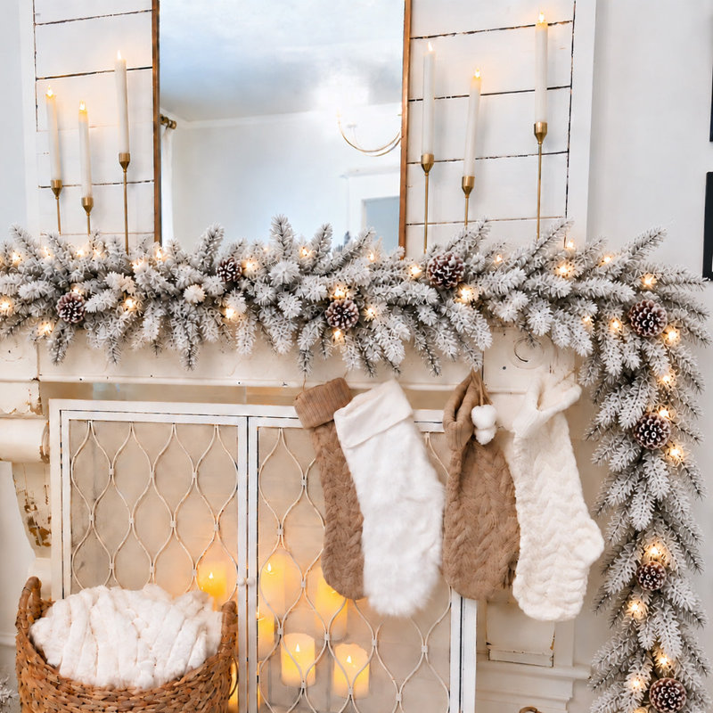Snowy Stockbridge Pre-Lit 9 Foot. Flocked Garland with Twinkle Lights and Silver Glitter Pinecones