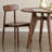 Artistic simple round solid wood dining table-104326765