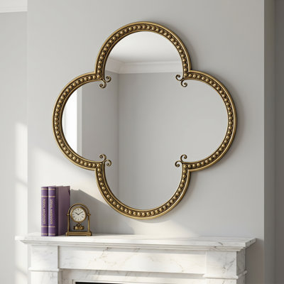 Miroir mural quadrilobe, grand cadre en métal perlé et miroirs dorés antiques