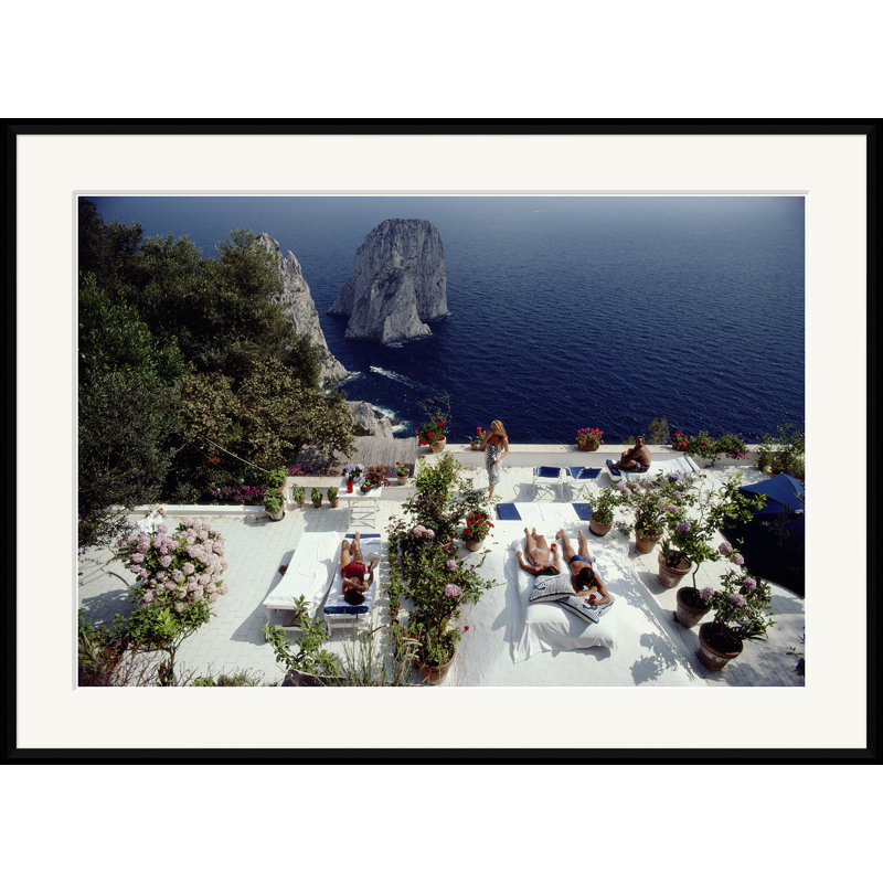 Il Canille Print by Slim Aarons, 31.75" H x 42.75" W x 2.125" D, Black Framed Paper