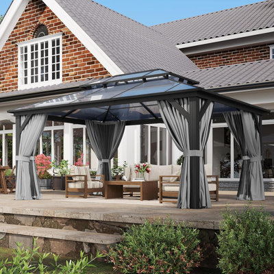 Pavillon de jardin rigide de 12 pi x 16 pi, pavillon permanent à cadre en aluminium avec rideaux et moustiquaire, auvent extérieur en polycarbonate à double toit, conçu pour le jardin, les pelouses et le patio