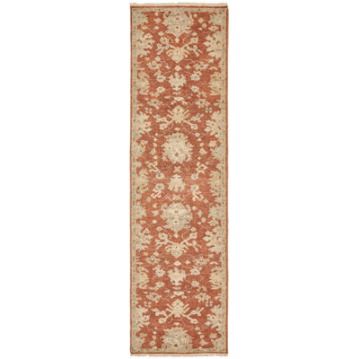 Kiernen Wool Flroal Area Rug in Rust
