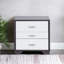 Table d'appoint contemporaine en blanc et noir, 3 supports, en composite et en bois de pin, avec 3 compartiments rectangulaires