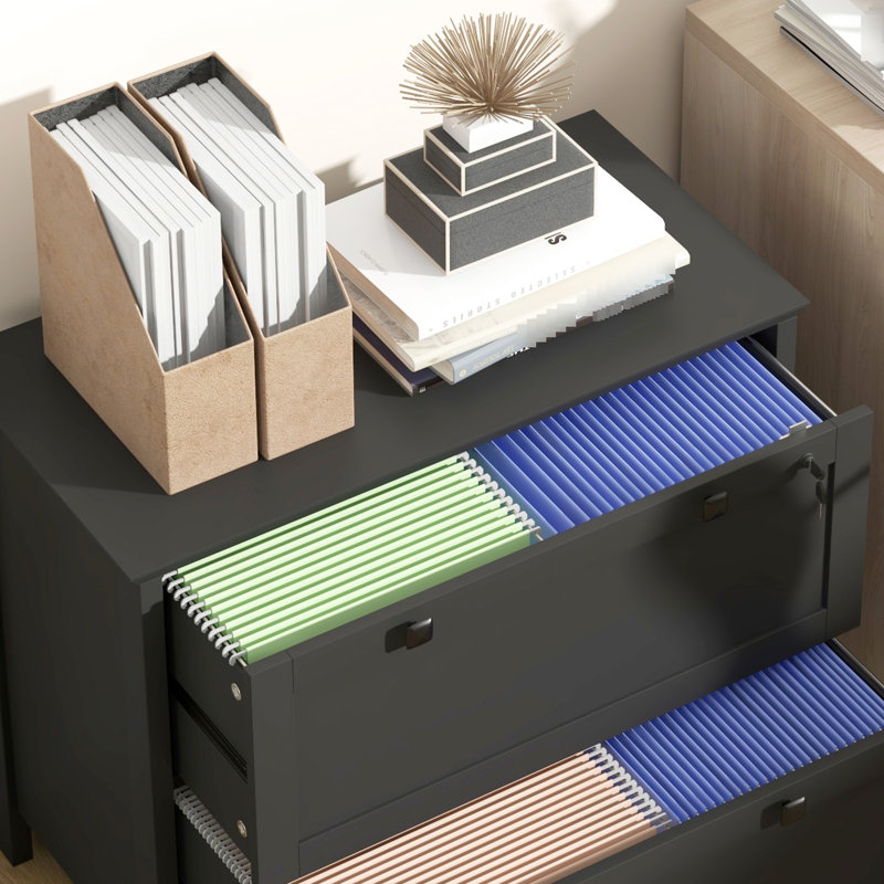 Black 2 Drawer File Cabinet For Home Office. Lockable To . Fits Multiple Sizes. Modern And Functional. Made From -Coated Particleboard. 31.1" L X 15.7" W 28.3" H. 132 Lbs Weight Capacity. Assembly