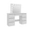 Grandes tables de coiffeuse blanches avec miroir et lumière
