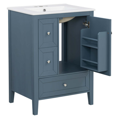 Meuble-lavabo moderne bleu-gris de 24 po avec lavabo en céramique intégré, tiroirs et porte à fermeture en douceur, pieds en bois massif et grand rangement organisé.